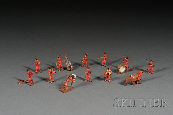 Twelve Piece Miniature Austrian Cold Painted Bronz: Twelve Piece Miniature Austrian Cold Painted Bronze Devil Orchestra, early 20th century, the red bodied and black horned demons playing various instruments, including piano, drum, cymbals, violin, upr