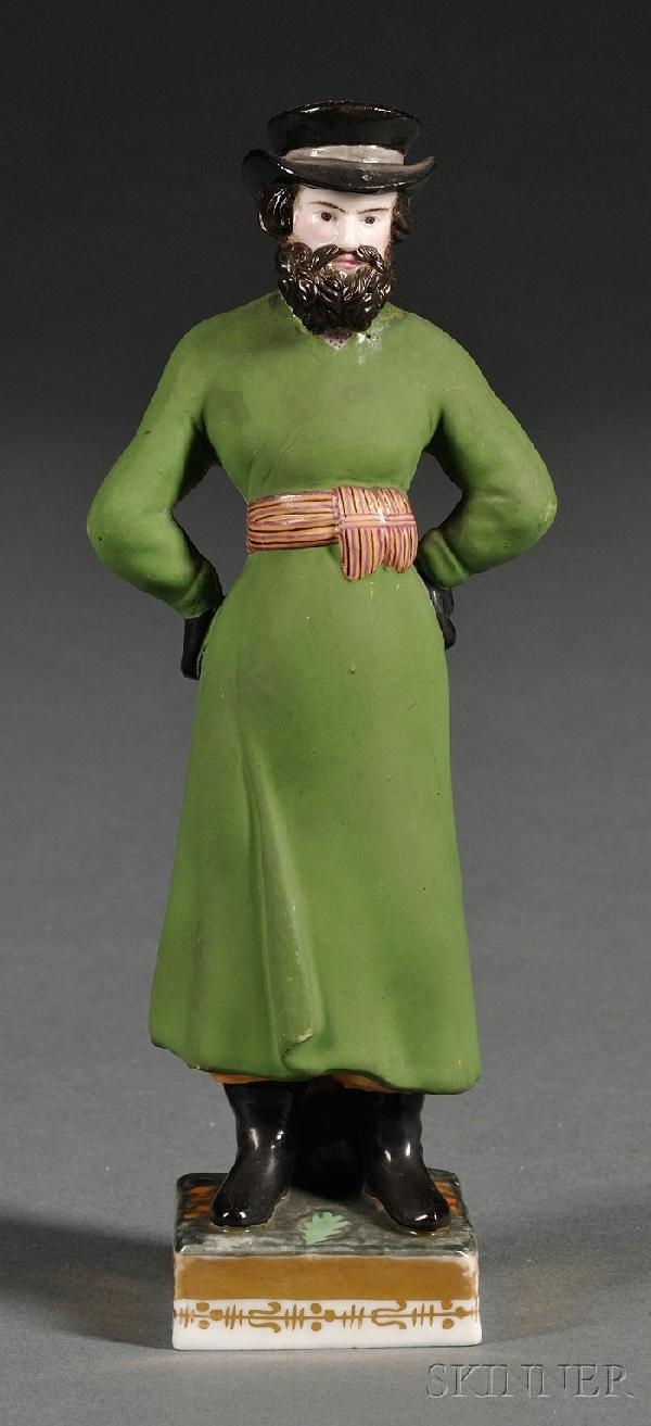 Gardner Porcelain Figure of a Coachman, Russian, c: Gardner Porcelain Figure of a Coachman, Russian, c. 1840, the bearded, standing figure wearing black cat and long green coat with sash, on square base, ht. 7 3/4 in.