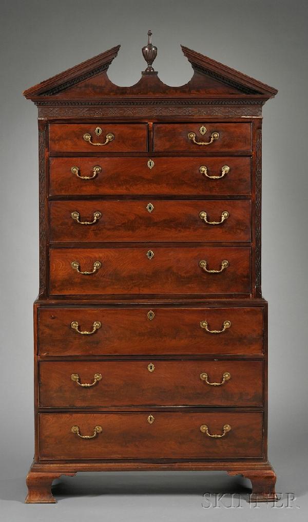 Georgian Mahogany Chest on Chest, 18th century, co: Georgian Mahogany Chest on Chest, 18th century, cornice with broken pediment and central urn finial above edges and frieze carved with dentil molding and blind fretwork; upper section with two short d