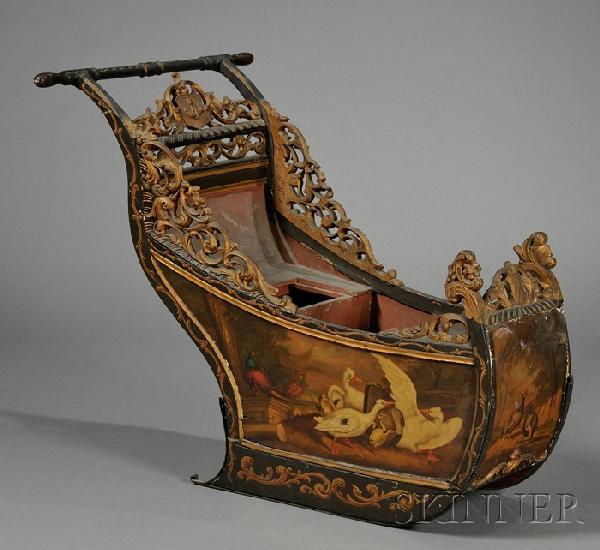 Dutch Painted Walnut Sled, 19th century, typical f: Dutch Painted Walnut Sled, 19th century, typical form with turned wood push-bar and borders applied with openwork panels of scrolling foliage and symbolic plaques, with plain interior; exterior painte