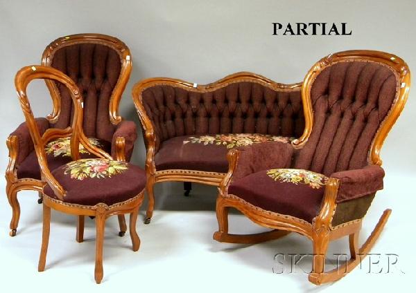 Six-piece Victorian Rococo Revival Needlepoint Uph: Six-piece Victorian Rococo Revival Needlepoint Upholstered Carved Walnut Parlor Set, including a settee, armchair, armrocker, and three side chairs.