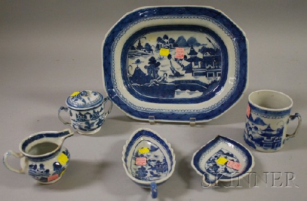 Six Pieces of Chinese Export Porcelain Canton Tab: Six Pieces of Chinese Export Porcelain Canton Tableware, a mug, creamer, covered sugar, a platter, and two shaped serving dishes, (good condition, wear, creamer with rim chips, small leaf dish with ri