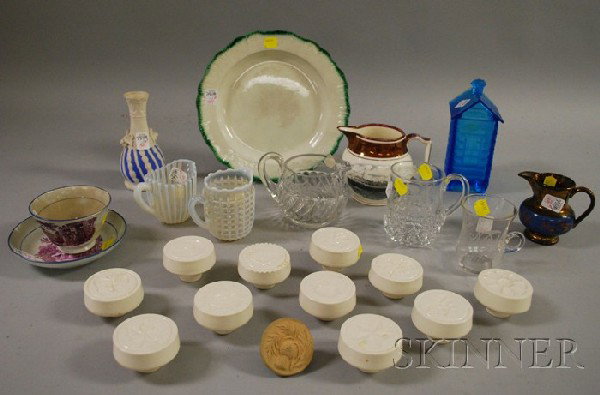 Twelve Miscellaneous Collectible and Decorative C: Twelve Miscellaneous Collectible and Decorative Ceramic, Glass, and Tableware Items with Eleven Ceramic Butter Stamps.