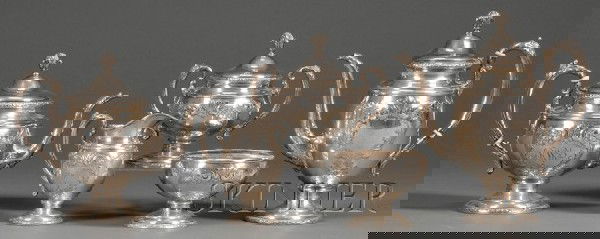 Five-piece Rococo-style Sterling Silver Tea and Cof: Five-piece Rococo-style Sterling Silver Tea and Coffee Service, Towle Silver Co., 20th century, with raised shaped rims with molded scroll and shell decoration, circular bodies with repousse reserves