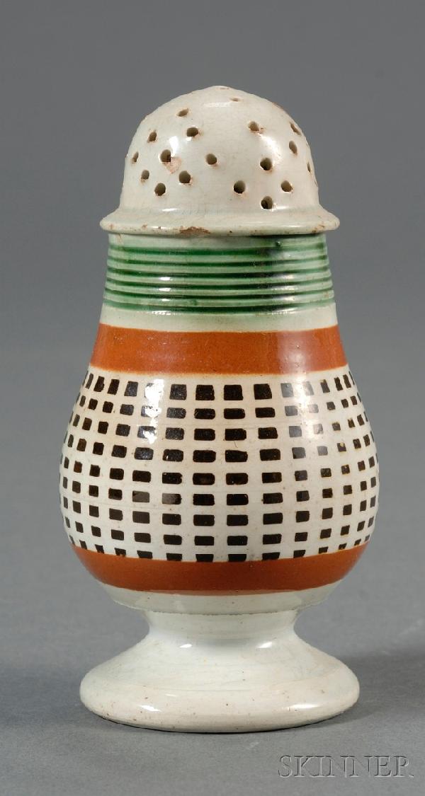 Mochaware Engine-turned Pepper Pot, Britain, c. 18: Mochaware Engine-turned Pepper Pot, Britain, c. 1800, pearlware with a green-glazed reeded band above rust bands bracketing a field of black inlaid engine-turning, ht. 4 in.