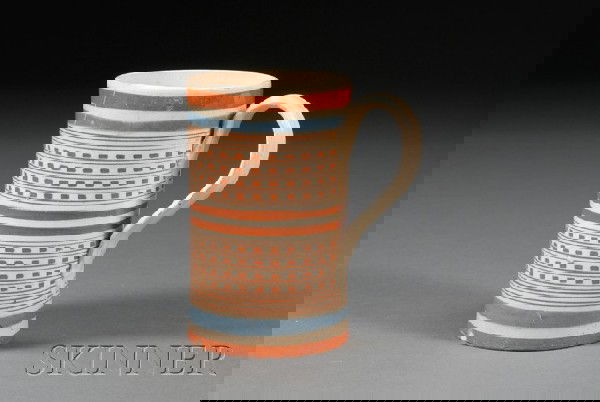 Mochaware Engine-turned Pint Mug, Britain, c. 1775: Mochaware Engine-turned Pint Mug, Britain, c. 1775, creamware pint mug banded in rust and blue with rust inlaid engine-turning, ht. 5 in.