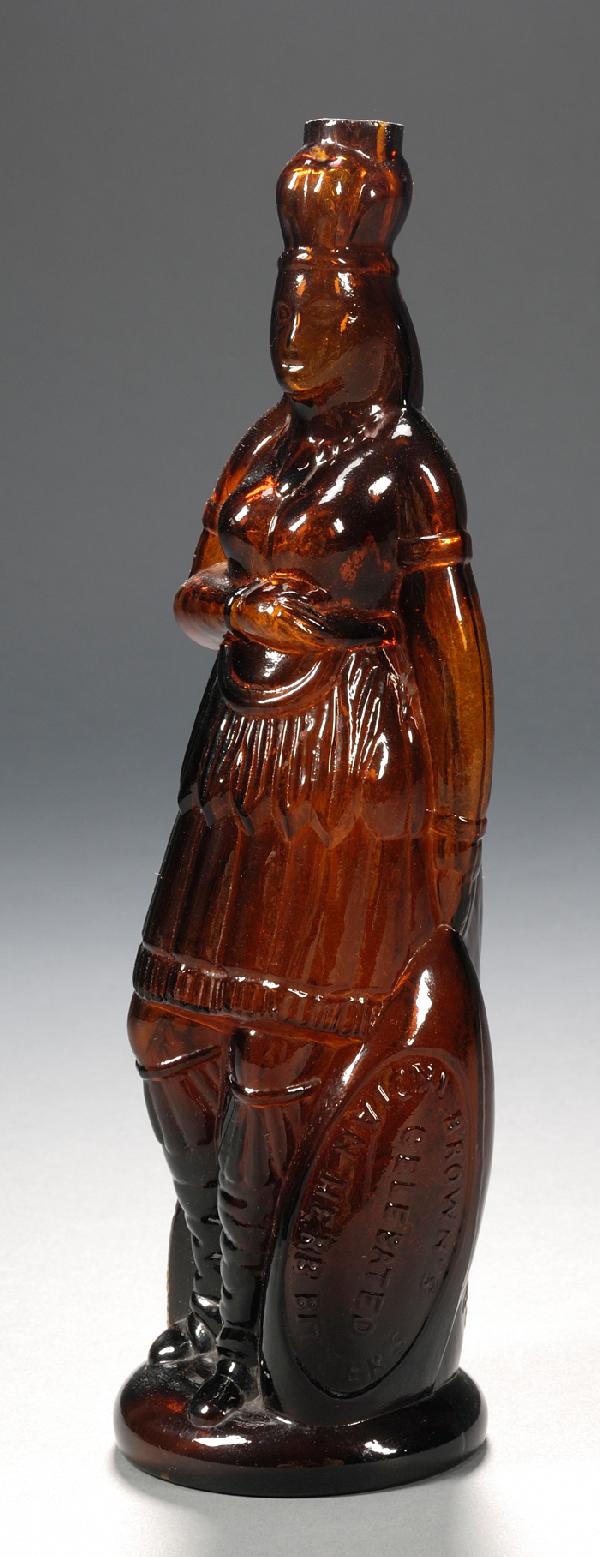 Amber Orange Molded Glass Indian Queen Herb Bitter: Amber Orange Molded Glass Indian Queen Herb Bitters Bottle, America, c. 1868-75, the bottle with ground lip and smooth base, embossed lettering on lower oval reserve "BROWN'S/CELEBATED [sic]/ INDIAN H