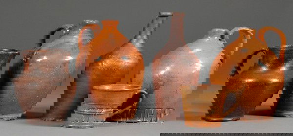 Five Redware Pottery Items, America, early 19th ce: Five Redware Pottery Items, America, early 19th century, two jugs, one decorated with brown manganese streaks, a mug, a pitcher, and a bottle with impressed maker's mark "GOODWIN &WEBSTER HARTFORD," (