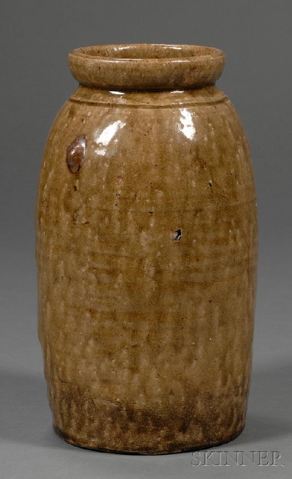 Tall Redware Jar, probably southeastern United Sta: Tall Redware Jar, probably southeastern United States, elongated ovoid form with "tobacco spit" alkaline glaze, ht. 11 1/2 in.