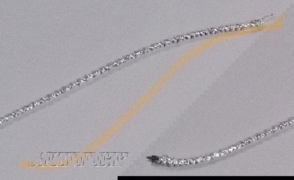 18kt Gold and Diamond Line Bracelet, Chaumet, Pari: 18kt Gold and Diamond Line Bracelet, Chaumet, Paris, set with full-cut diamonds, in half bezel and prong mounts, approx. total wt. 4.06 cts., lg. 6 1/2 in., signed.