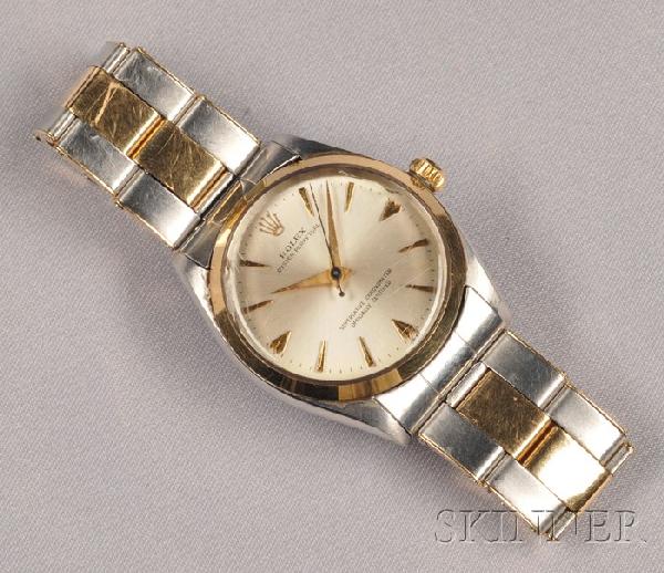 Stainless Steel and 14kt Gold Wristwatch, Rolex, ": Stainless Steel and 14kt Gold Wristwatch, Rolex, "Oyster Perpetual," silver-tone dial with abstract numeral indicators, enclosing automatic movement, model no. 1002, serial no. 518920, President brace