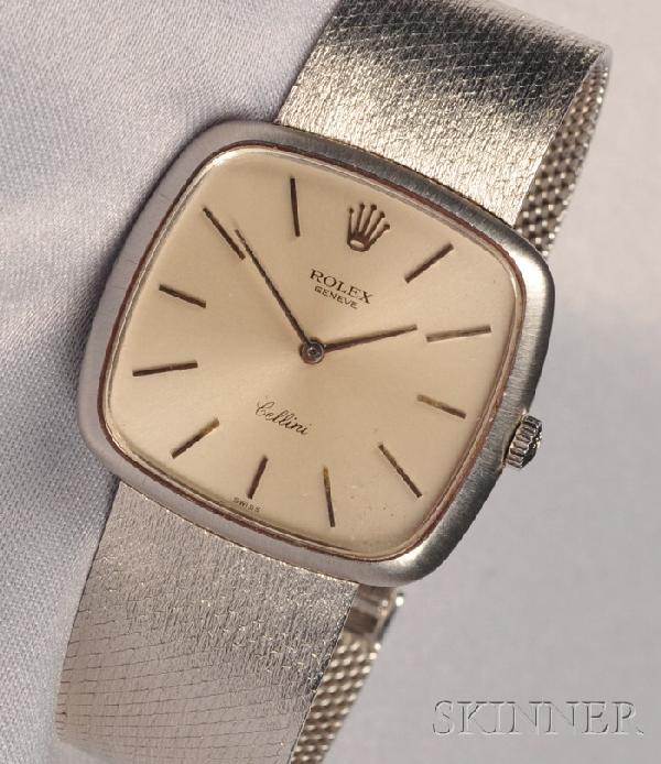 18kt White Gold "Cellini" Wristwatch, Rolex, the w: 18kt White Gold "Cellini" Wristwatch, Rolex, the white metal dial with baton numeral indicators and polished bezel, completed by textured mesh bracelet, 46.2 dwt, interior cir. 6 1/2 in., boxed.