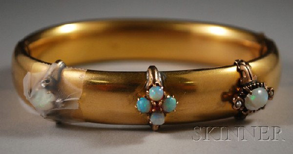 Gilt Opal Bangle, (two stones cracked or loose).: Gilt Opal Bangle, (two stones cracked or loose).