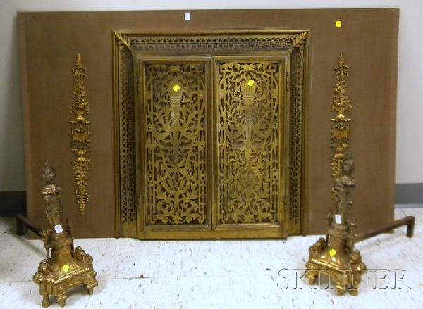 Neoclassical Openwork Brass and Metal Fireplace Fa: Neoclassical Openwork Brass and Metal Fireplace Facade and a Pair of Cast Brass Andirons.