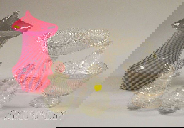 Five Late Victorian Colored and Colorless Glass Ta: Five Late Victorian Colored and Colorless Glass Table Items, an opalescent and cranberry glass swirl vase, a colorless compote, a pair of jars, and a footed bowl with cover.