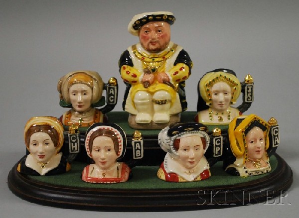 Set of Seven Miniature Royal Doulton Henry VIII an: Set of Seven Miniature Royal Doulton Henry VIII and Wives Ceramic Toby and Character Jugs, including D 7047. Provenance: The Collection of Anne Babchyck.