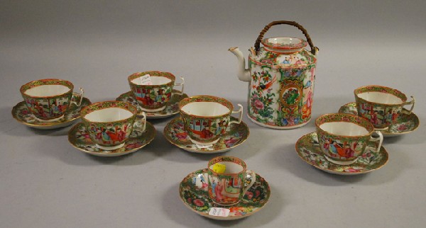 Fifteen Pieces of Chinese Export Rose Medallion P: Fifteen Pieces of Chinese Export Rose Medallion Porcelain Tableware, a teapot, six cups and saucers, a demitasse cup, and a saucer.