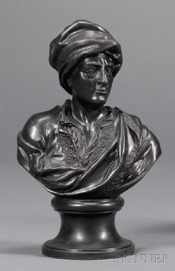 Wedgwood and Bentley Black Basalt Bust of Prior, En: Wedgwood and Bentley Black Basalt Bust of Prior, England, 18th century, mounted atop a waisted circular socle, impressed title and mark, ht. 7 1/8 in.