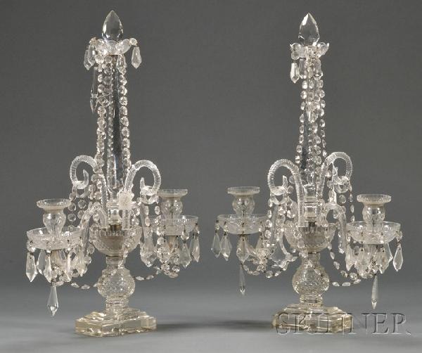 Pair of British Colorless Cut Glass Two-light Tabl: Pair of British Colorless Cut Glass Two-light Table Lustres, with tall central finial set into ovoid and baluster-form stem supporting pair of serpentine candle arms with thistle sconces and dished dr