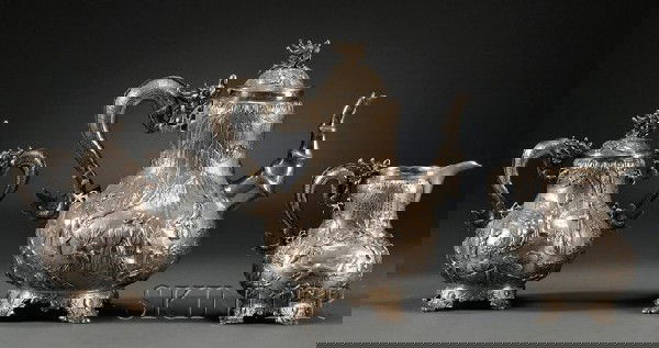 Three-piece Chinese Export Silver Tea Set, Shangha: Three-piece Chinese Export Silver Tea Set, Shanghai, late 19th/early 20th century, Tuck Chang & Co., with chased and embossed decoration of figures at various pursuits including riding water buffalo,