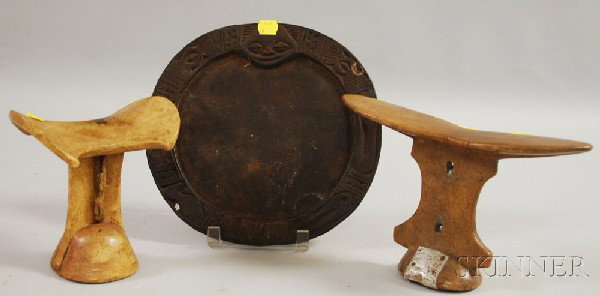 Three African Wooden Items, two Yoruba wooden neck: Three African Wooden Items, two Yoruba wooden neck rests and one Yoruba divination tray, dia. 9 1/2 in.