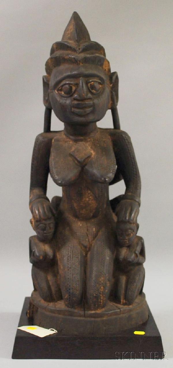 Yoruba or Yoruba-style Kneeling Female Figure, Nig: Yoruba or Yoruba-style Kneeling Female Figure, Nigeria, wood, ht. 26 1/2 in.