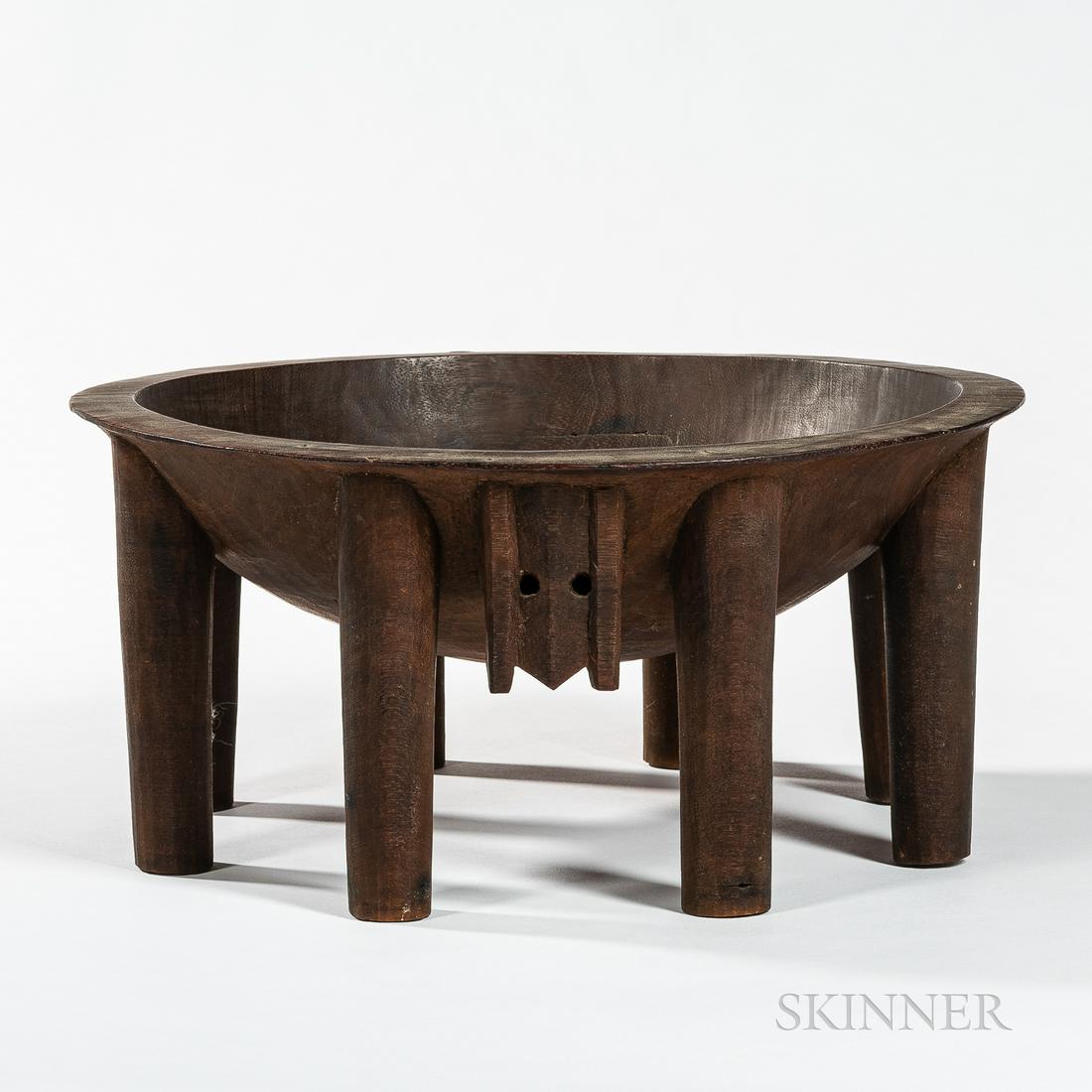 Samoan Kava Bowl, late 19th century, multi-legged bowl,: Samoan Kava Bowl, late 19th century, multi-legged bowl, with carved suspension lug pierced with two holes, (age cracks in the wood), ht. 8, dia. 16 in. Provenance: The Charles and Blanche Derby collec