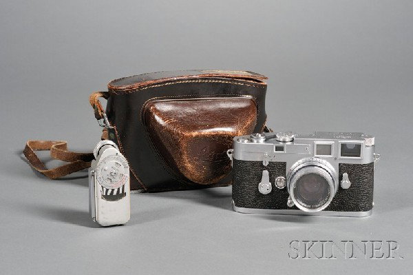 Leica M3 No. 707090, with Summicron f/5cm 1:2 lens: Leica M3 No. 707090, with Summicron f/5cm 1:2 lens, light meter and leather case.