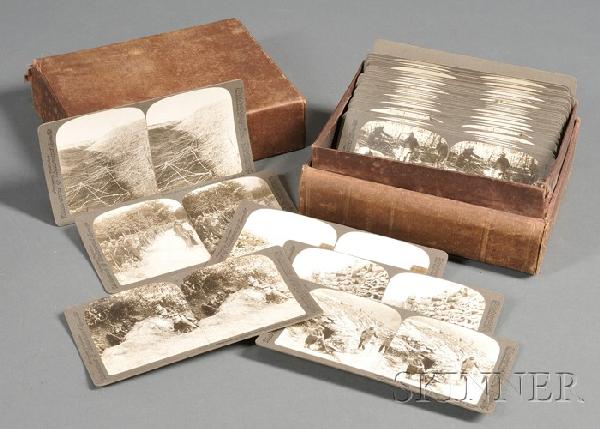 Box of Approximately Forty-six World War I Stereos: Box of Approximately Forty-six World War I Stereoscopic Cards, Underwood & Underwood, depicting battle scenes and the devastation after, in a faux book holder, lg. 7, ht. 3 1/2 in.