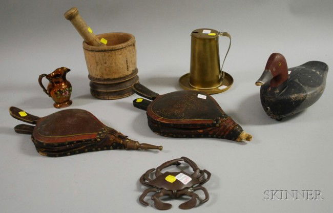Nine Assorted Decorative Articles, including two: Nine Assorted Decorative Articles, including two painted wooden bellows, a carved and painted wooden duck decoy, a wood mortar and pestle, a copper lustre jug, a brass Cape Cod lighter and undertray,
