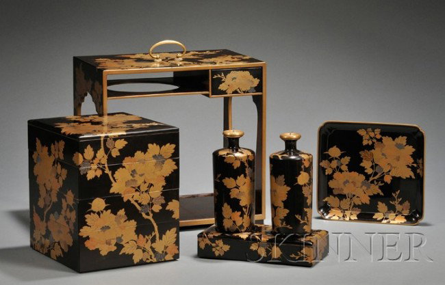 Gilt-lacquered Picnic Box, Japan, Meiji-Taisho per: Gilt-lacquered Picnic Box, Japan, Meiji-Taisho period (1868-1926), decorated in gold, silver, and colored hiramaki-e and nashiji with an overall design of peony branches, including a square quatrefoil