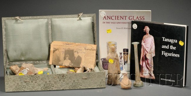Lot of Antiquities, consisted of three Roman glass: Lot of Antiquities, consisted of three Roman glassware and ten pottery statues or jars, together with two books, Tanagra and the Figurines, Trefoil Books, London, and Ancient Glass in the Yale Univers