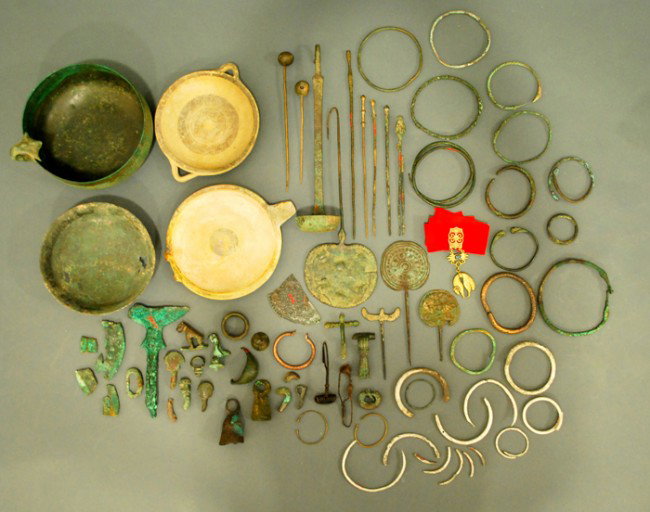 Lot of Assorted Metal Antiquities, include two bro: Lot of Assorted Metal Antiquities, include two bronze cups, two pottery cups, a group of silver bracelets, bronze bracelets, cloak pins and various fragments.