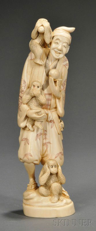 Ivory Carving, Japan, 19th century, standing figur: Ivory Carving, Japan, 19th century, standing figure of a circus man with the Three Wise Monkeys, mark to the base, ht. 10 in.