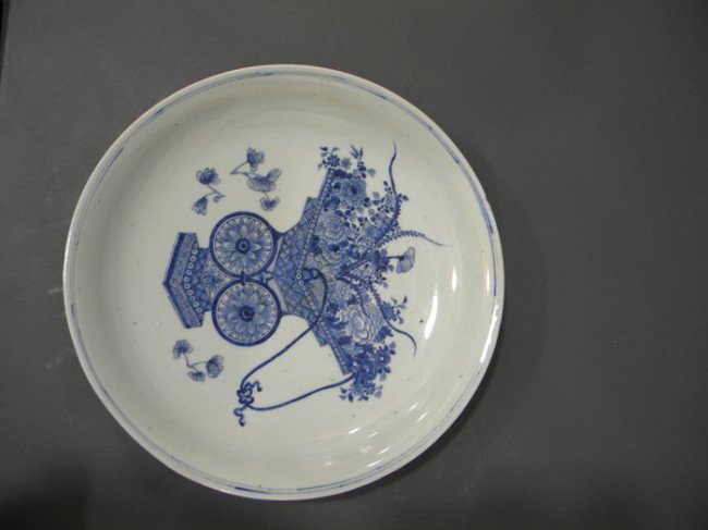 Blue and White Plate, China, 18th century, finely : Blue and White Plate, China, 18th century, finely painted in underglaze blue with a multitude of flowers in a fang zun vase, the exterior with floral sprays, dia. 14 3/4 in.