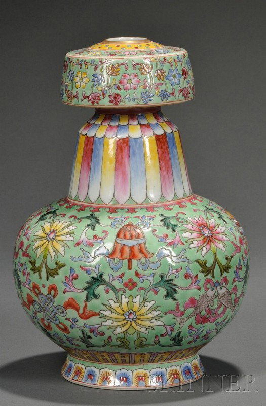 Famille Rose Vase, China, 20th century, the bulbou: Famille Rose Vase, China, 20th century, the bulbous body decorated with stylized lotus flowers alternating with the Eight Buddhist Treasures, all borne on leafy tendrils, lishui design around the neck