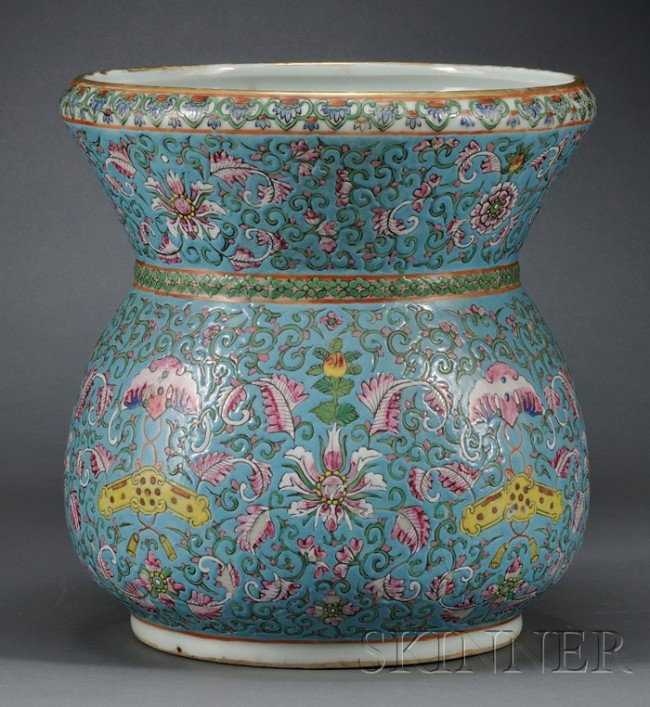 Famille Rose Zhadou, China, 19th century, the roun: Famille Rose Zhadou, China, 19th century, the round body and flaring mouth enameled with bats suspending qing pendants amidst stylized lotus meanders, all reserved on a turquoise ground, ht. 10, dia. 