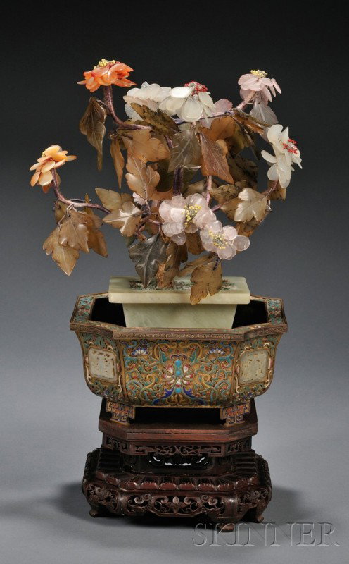 Jade Flower Pot in a Champleve Enameled Planter, C: Jade Flower Pot in a Champleve Enameled Planter, China, 19th century, with chalcedony, semi-translucent white jade, and gray/spinach green jade forming the flowers and the leaves, the branches issuing