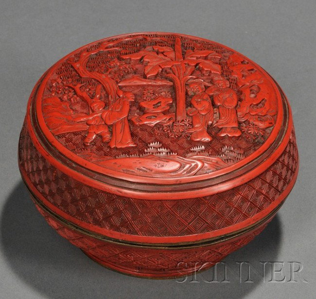 Cinnabar Box, China, 19th century, circular shape,: Cinnabar Box, China, 19th century, circular shape, the cover carved with a scholar and his attendant paying a visit to two ladies, set in a garden scene with rockery, plantain plants, and pine trees,