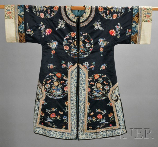 Embroidered Robe, China, late 19th century, finely: Embroidered Robe, China, late 19th century, finely embellished with roundels of bats and floral scrolls, amidst flower and fruit sprays, all set on a navy blue ground.