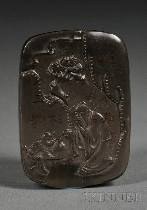 Smoky Quartz Pendant, China, 19th century, the fro: Smoky Quartz Pendant, China, 19th century, the front finely carved in relief with an Immortal receiving a peach offered by a small monkey, in a mountainous landscape setting, the reverse with incised 