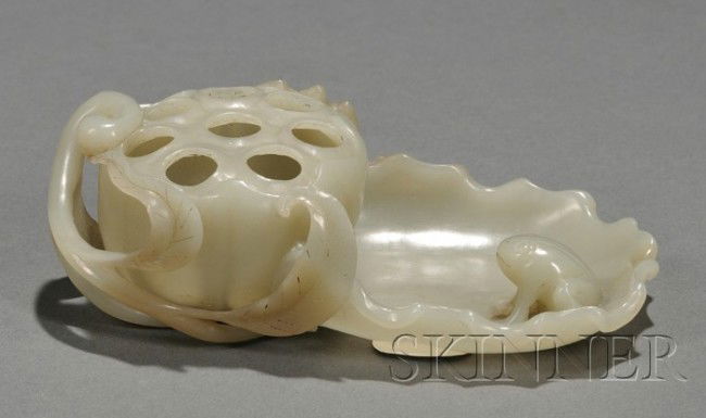 Jade Carving, China, carved in high relief as a f: Jade Carving, China, carved in high relief as a frog sitting on a lotus leaf, facing a huge lotus seed pod, the stone of celadon color, lg. 5 1/8 in.
