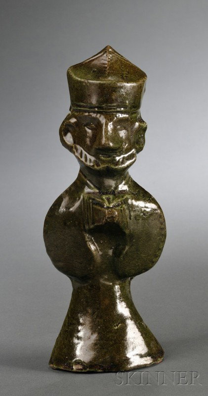 Green Glazed Pottery Figure, China, Han dynasty (: Green Glazed Pottery Figure, China, Han dynasty (206 B.C.–220 A.D.), figure of a foreign emissary kneeling down while holding a staff in front of his chest, covered with a thick green glaze, ht. 7 i