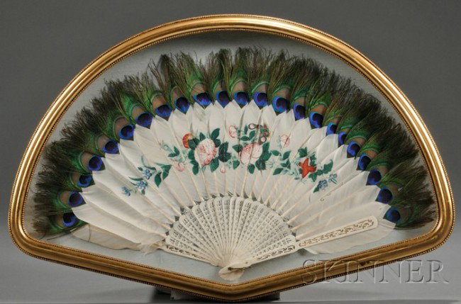 Framed Fan, China, late 19th/early 20th century,: Framed Fan, China, late 19th/early 20th century, carved and pierced ivory sticks with white feathers finely painted in gouache with rose branches, with peacock feather border to the top, framed and gl