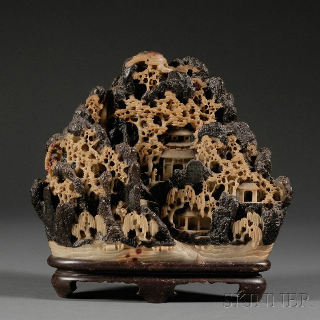 Soapstone Carving, China, 19th century, black and: Soapstone Carving, China, 19th century, black and tan stone carved as pavilions in a mountain landscape, wd. 11, lg. 10 in.