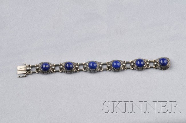 Sterling Silver and Lapis Bracelet, Georg Jensen, : Sterling Silver and Lapis Bracelet, Georg Jensen, each link designed as a cabochon amongst foliage, lg. 7 1/8 in., no. 57A, signed Georg Jensen, Denmark.