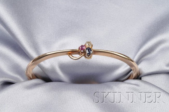 Antique 14kt Gold Gem-set Bangle, Russia, the hing: Antique 14kt Gold Gem-set Bangle, Russia, the hinged bangle centering an old mine-cut diamond, cabochon ruby, and pear-shape sapphire clover motif, interior cir. 6 1/2 in., hallmark for 1861-1900, mak