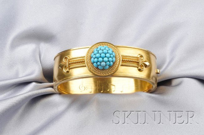 Antique 14kt Gold and Turquoise Bracelet, the hing: Antique 14kt Gold and Turquoise Bracelet, the hinged bangle centering a dome of cabochon turquoise, applied bead and ropetwist accents, the interior engraved with a musical stave, 22.9 dwt, interior c