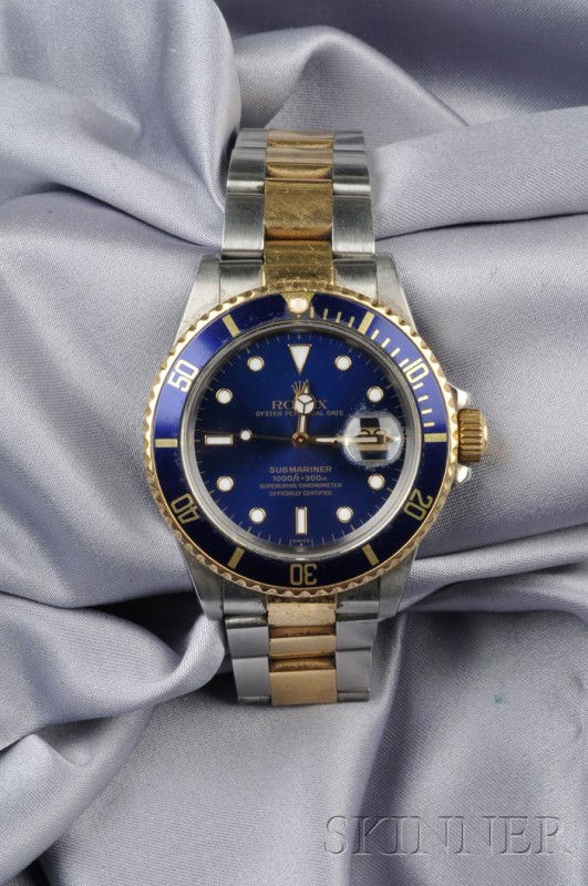Stainless Steel and 18kt Gold "Submariner" Wristwa: Stainless Steel and 18kt Gold "Submariner" Wristwatch, Rolex, "Oyster Perpetual Date," style no. 168033, the royal blue dial with abstract numeral indicators with date aperture, time elapse bezel, com