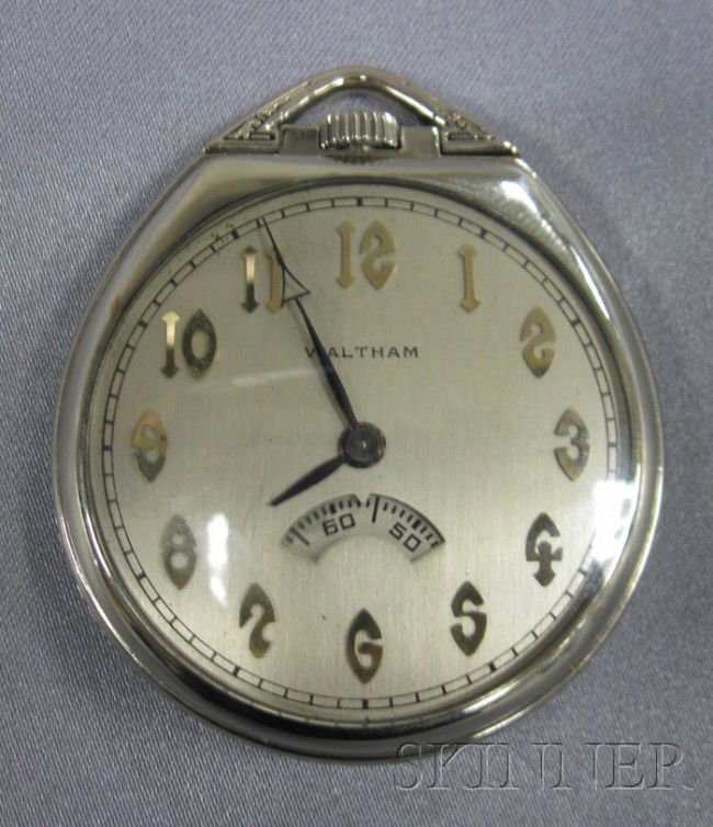 Art Deco Open Face Pocket Watch, Waltham, the silv: Art Deco Open Face Pocket Watch, Waltham, the silver metal dial with stylized Arabic numeral indicators and seconds aperture, enclosing a 17-jewel movement no. 27141260, the 14kt gold-filled case no.